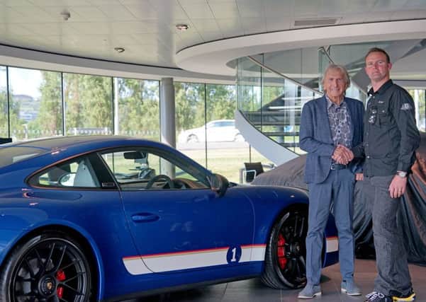 Tony Gatt, Centre Principal at Porsche Centre Portsmouth, with Derek Bell and the limited edition British Racing Legends 911 Carrera 4 GTS