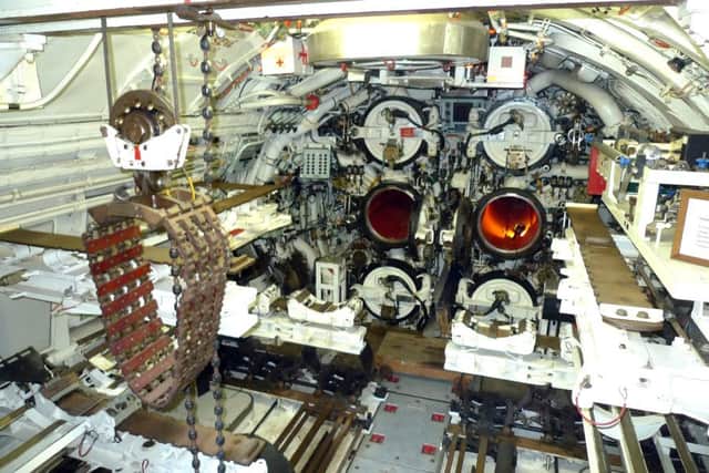 Six torpedo tubes inside the preserved Royal Navy submarine Otus.   After many years in the mud of John Pounds's scrapyard, Otus is preserved in Sassnitz, Germany.