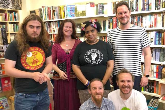 Portsmouth South MP gives a shift at Southsea Oxfam shop for Volunteers Week. Back, left to right, Dylan Davies Goble, Rachel Orr, Lynette Adams, Stephen Morgan; Front, left to right, Loic lajon and Julian Martin.