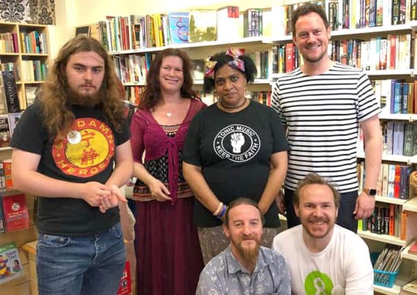 Portsmouth South MP gives a shift at Southsea Oxfam shop for Volunteers Week
. Back, left to right, Dylan Davies Goble, Rachel Orr, Lynette Adams, Stephen Morgan; 
Front, left to right, Loic lajon and Julian Martin.