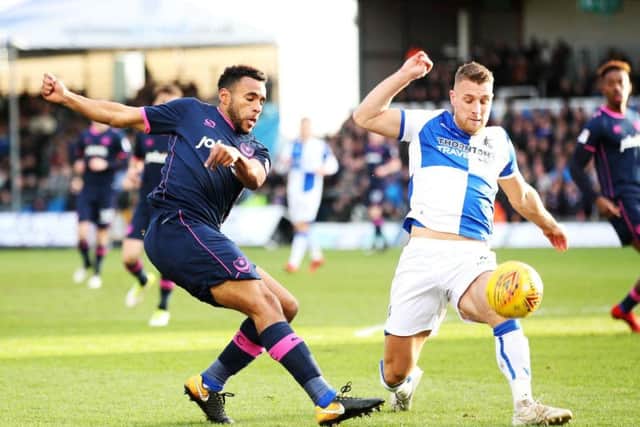 Lee Brown challenges Nathan Thompson during Pompey's 2-1 loss at Bristol Rovers on New Year's Day. Picture: Joe Pepler/ PinPep