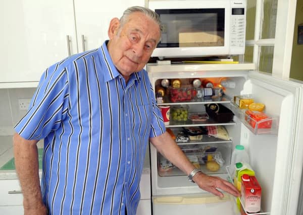 Michael Ord, 83, from Portchester faced a bill for £764.67 when he ordered a replacement hinge for his fridge Picture: Malcolm Wells (180606-2505)