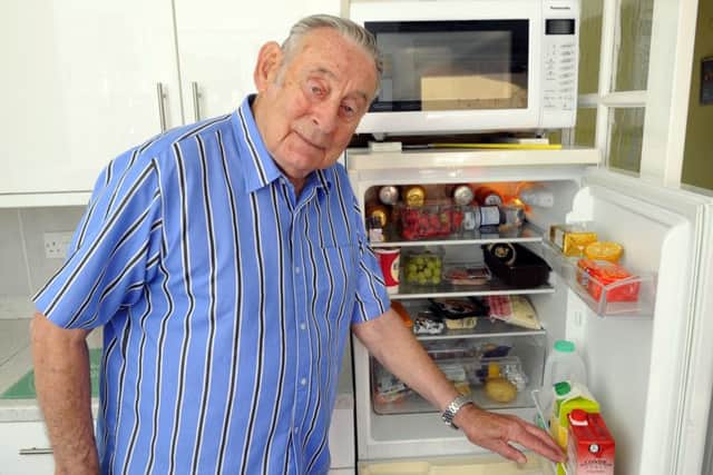 Michael Ord, 83, from Portchester faced a bill for Â£764.67 when he ordered a replacement hinge for his fridge     Picture:  Malcolm Wells (180606-2505)
