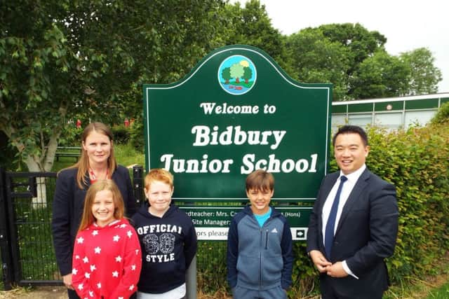 Alan Mak MP with headteacher Caroline Mason and pupils from Bidbury Junior School in Havant