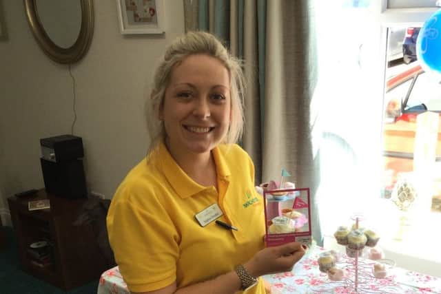 Sophie Dryden with the cupcakes she made as The Fernes care home in Fareham in support of the Alzheimer's Society's Cupcake Day.