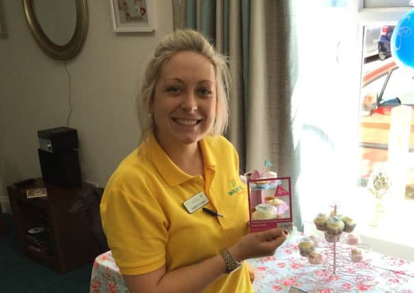 Sophie Dryden with the cupcakes she made as The Fernes care home in Fareham in support of the Alzheimer's Society's Cupcake Day.