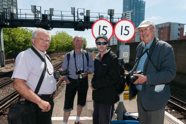 Excited railway enthusiast await the arrival of the Black Five steam locomotive 45212. Picture: Duncan Shepherd