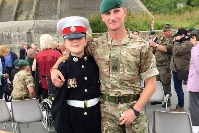 Royal Marine Volunteer Cadet Jimmy Ring, left, with WO1 Lee Drinkwater RSM in Port en Bessin, in Normandy.