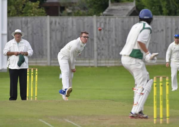 Sam Robinson took five wickets to clinch victory for Bedhampton. Picture: Neil Marshall