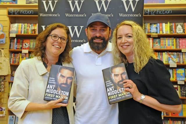 Ant Middleton with, left, Claire Middleton from Lee-on-the Solent and her friend Rae Gamblin from Gosport at Waterstones in Portsmouth this month Picture: Malcolm Wells (180607-2835)