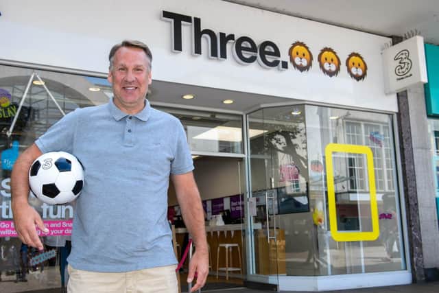 Paul Merson outside the rebranded Three store in Commercial Road. Picture: Three