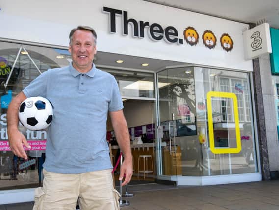 Paul Merson outside the rebranded Three store in Commercial Road. Picture: Three