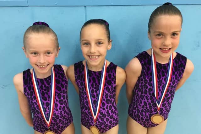 Suki gymnastics Amiee Dalgleish, Immie Hamid and Keira Buick