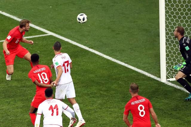 Harry Kane scores his second goal for England to beat Tunisia. Picture: PA