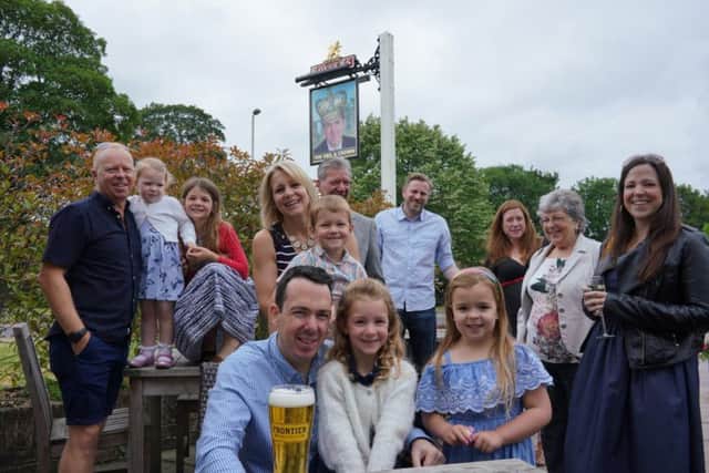 Neil Wilkie and his family at The Neil & Crown in Bishops Waltham today