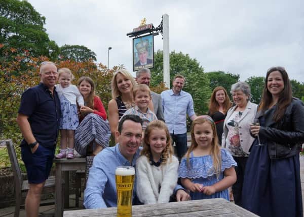Neil Wilkie and his family at The Neil & Crown in Bishops Waltham today