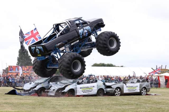 Monster truck Grim Reaper in action at the HMS Sultan Summer Show. Thousands of visitors enjoyed an exciting Fathers Day weekend recently at the HMS Sultan Summer Show 2018.  The not-for-profit Show was jam-packed with high quality Arena Entertainment including Monster Trucks, a Steam Fayre and motorcycle displays with the Royal Naval Volunteer Cadet Corps Field Gun and the HMS Sultan Volunteer Band ensuring the Show was in keeping with the best of Naval Traditions.  Outside of the Main Arena an enormous funfair, a free Fun and Games Arena, petting zoo, static airframe displays, creepy crawlies, craft and chairties tents, classic cars and a Georgian Gun Deck Experience based around the Battle of Trafalgar kept visitors entertained. In addition, guests were also given the opportunity to book their own ride on the Red Dragon; Moster Ride Truck.  On top of everythinng else on offer 2018 marks The Year of Engineering, a year long cross-government campaign. Picture: PO Phot Nicola Harper.