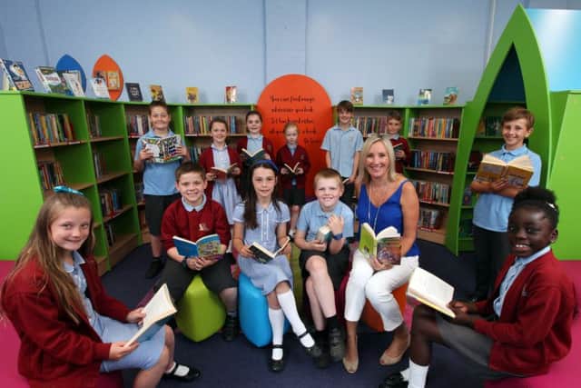 The School Council and Caroline Dinenage MP at the opening of the new library at Crofton Anne Dale Junior School, Stubbington. Picture: Chris Moorhouse