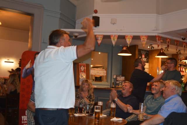Fans erupt in joy as Kane scores the winner