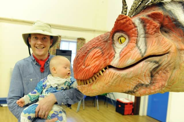 Baby Henry Stray doesn't seem worried by Dino Pete
Picture by Malcolm Wells (180614-3975)