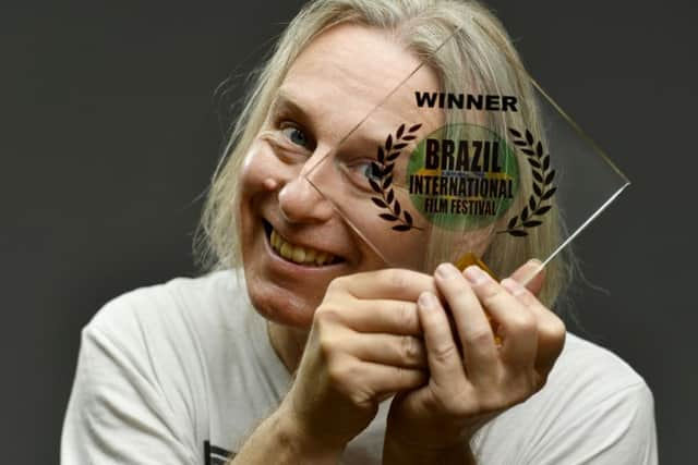 Gavin Irvine with his Best Short Film award, from the Brazil International Film Festival.  Picture by Geoff Pugh