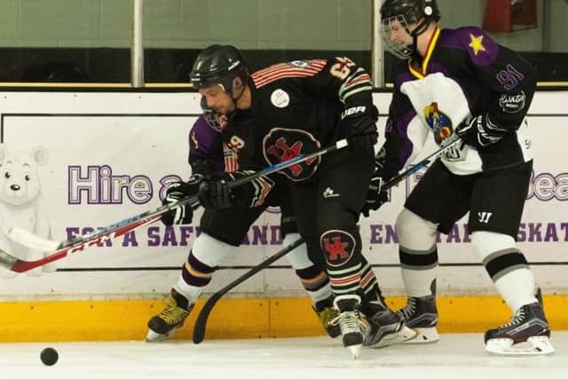 Action from the charity ice hockey match.
Picture by Keith Woodland 180613-172319006