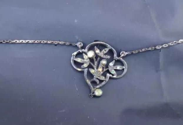 The necklace the woman was found wearing