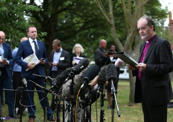 Chairman of the panel, Bishop James Jones, the former Bishop of Liverpool, speaks to the media