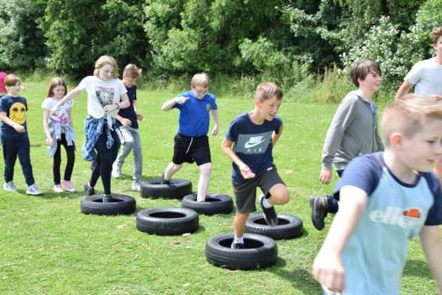 Youngsters taking on the Race for Life event at Brune Park Community School in Gosport.