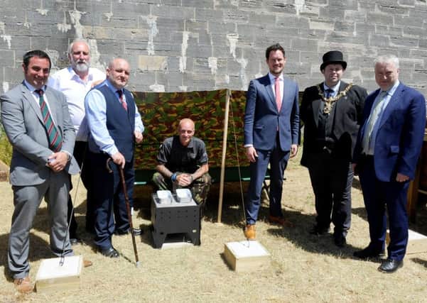 A veterans retreat is hoping to get the green light to be created and built at Fort Cumberland in Eastney for veterans in hardship.
Pictured, from left: David McMullen, project manager for veterans retreat; Tony Reid, trustee and co-founder of Forgotten Veterans UK;, Gary Weaving, CEO and founder of Forgotten Veterans UK; Jonno Rowlinson, volunteer at Forgotten Veterans UK; Stephen Morgan MP; The Lord Mayor of Portsmouth, cllr Lee Mason and the Leader of Portsmouth City Council Gerald Vernon-Jackson.
Picture: Sarah Standing (180529-7636)