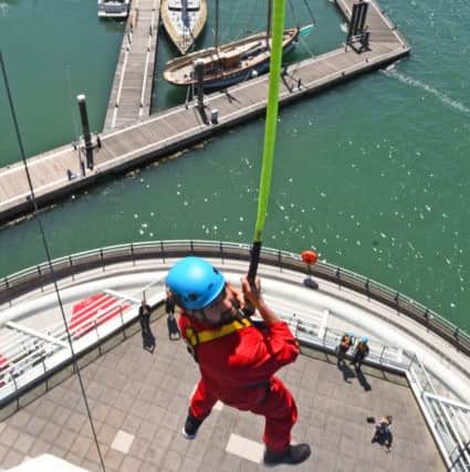 Jamie Jewitt leaps from the Emirates Spinnaker Tower.
Picture by Solent News