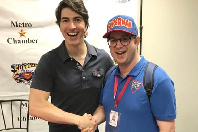 Luke Bugg, right, with Superman Returns star Brandon Routh