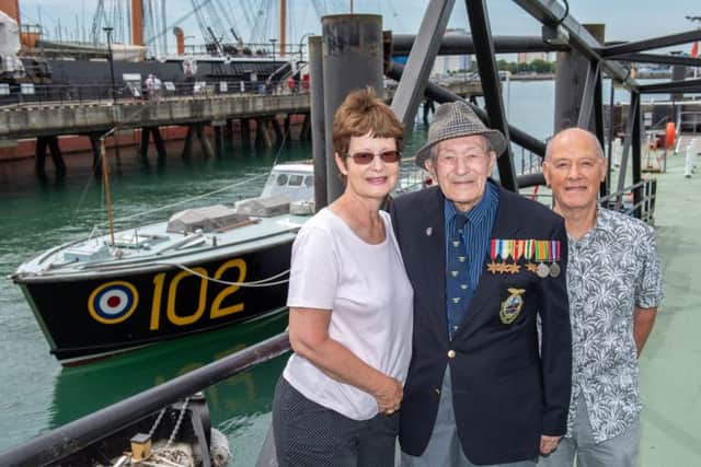 Charles Meacock with his daughter Kate Meacock and son-in-law Peter Stewart with high speed launch HLS102. Charles served on HLS122 during the second world war
Picture: Vernon Nash (180395-003)