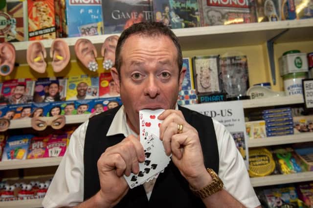 Magician Roy Charles performs at the U-Need-Us celebrations Picture: Vernon Nash (180396-008)