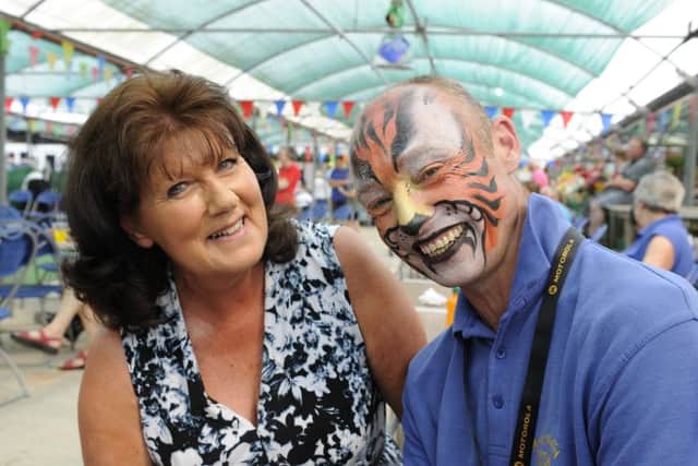 Pictures of the charity event at the nursery last week, which almost cost them £6,000 to staged. Pictured is Rose Percy and staff member Gareth Davies.
PHORO: Ian Hargreaves (180624-1_folly) PPP-180624-174102006