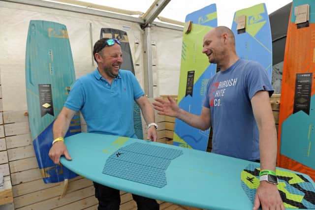 James Fitch, left, enjoys a joke with stallholder Mike Birt
Picture: Ian Hargreaves (180624-1)