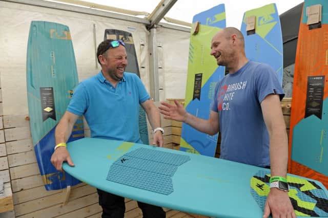 James Fitch, left, enjoys a joke with stallholder Mike Birt

Picture: Ian Hargreaves (180624-1)