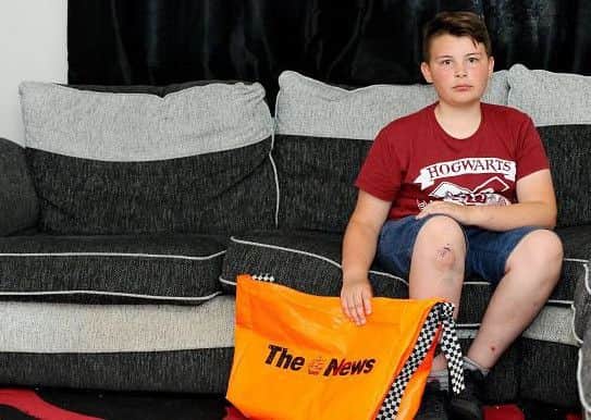 News paperboy Samuel Heslop at his Havant home. Picture: Sarah Standing