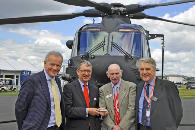 Barnbrook off to flying start for Farnborough Airshow
From left, Leonardo Helicopters UK Managing Director John Ponsonby, Leonardo Senior Vice-President UK Sir Brian Burridge, Barnbrook Systems Managing Director Tony Barnett, and Farnborough Aerospace Consortium (FAC) chief executive David Barnes