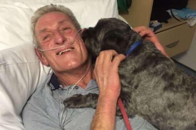 Andy Szasz and Teddy the rescue dog