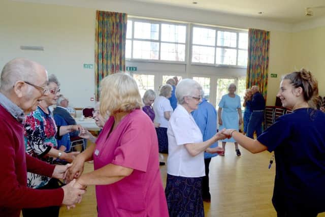 Care home residents and their carers strut their stuff on the dance floor at the Dementia Tea Dance at St Faith's Church Parish Centre in Lee-on-the-Solent   Picture by David George