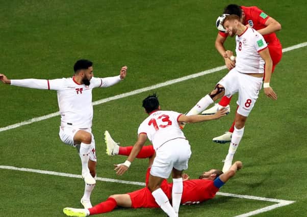 England's Harry Kane goes down in the area during the FIFA World Cup Group G match against Tunisia Picture: Tim Goode/PA Wire
