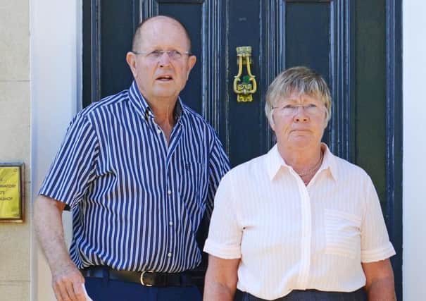 Dr Jane Barton and her husband Tim Barton outside their home in Gosport. Picture: Morten Watkins/Solent News & Photo Agency
