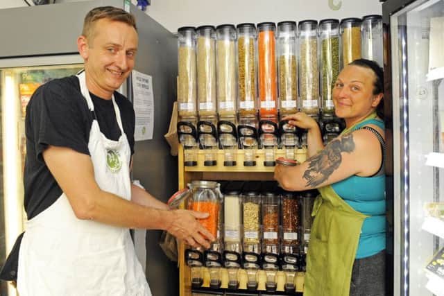 Wild Thyme on Palmerston Road, in Southsea, is continuing its ongoing crusade against plastic waste by installing a new refill area - customers are invited to bring their own containers and serve themselves with a wide variety of products. Pictured are Stuart Mills and Kelly Kemp
Picture by Malcolm Wells (180627-5842)