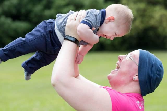 Lynette Kirkham, 31, from Gosport, with her son Elijah. Picture: Cancer Research UK.