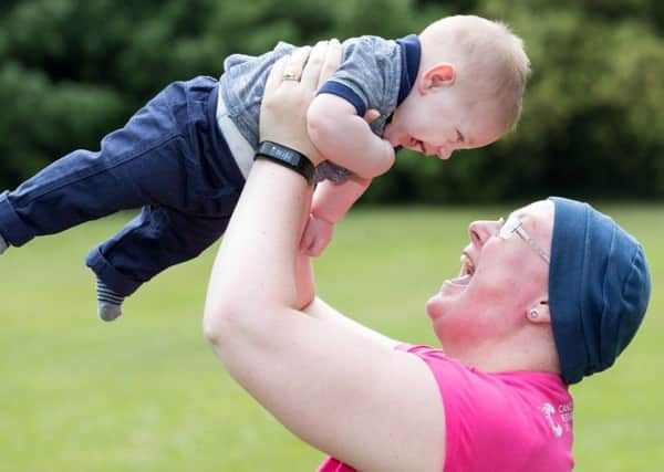 Lynette Kirkham, 31, from Gosport, with her son Elijah. Picture: Cancer Research UK.