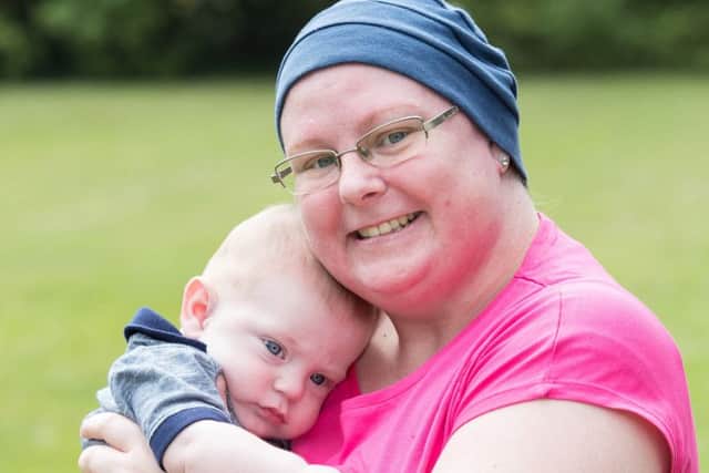 Lynette Kirkham, 31, from Gosport, with her son Elijah. Picture: Cancer Research UK.