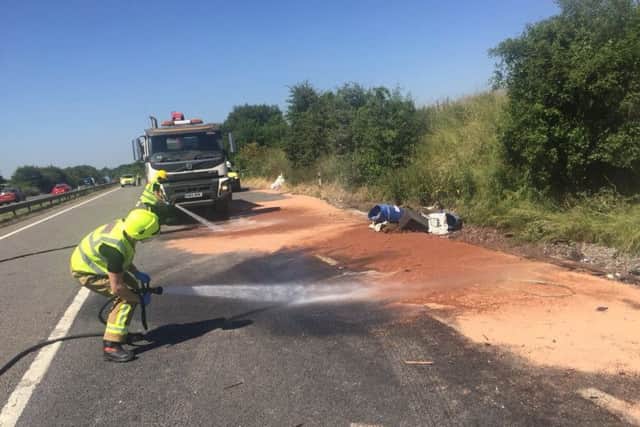 Teams working to clean the road earlier today. Picture: Hants Roads Policing on Twitter