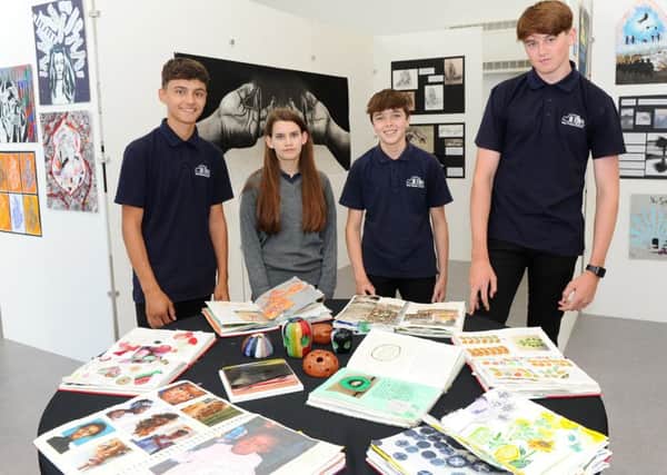 Bay House School in Gosport held their Summer Art Show with a collection of artwork.

Pictured is, left to right, Ryan Parnell (15), Leni Millard (14), Tom Brown (14) and Evan Watson (15).

Picture: Sarah Standing