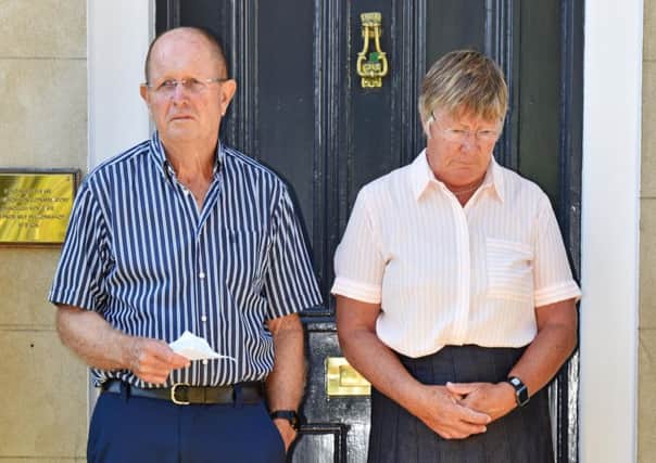 Dr Jane Barton with her husband Tim Barton, who read a statement at their home in Gosport this morning. Picture: Morten Watkins/Solent News & Photo Agency